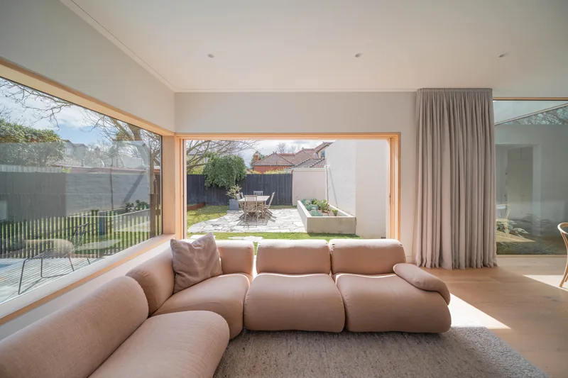 Malvern East Residence, living room opening to the garden